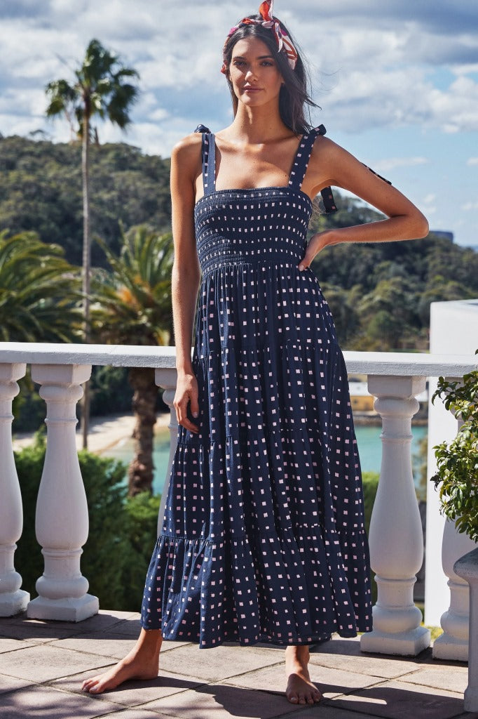 Robe mi-longue plissée extensible sans manches à imprimé pois