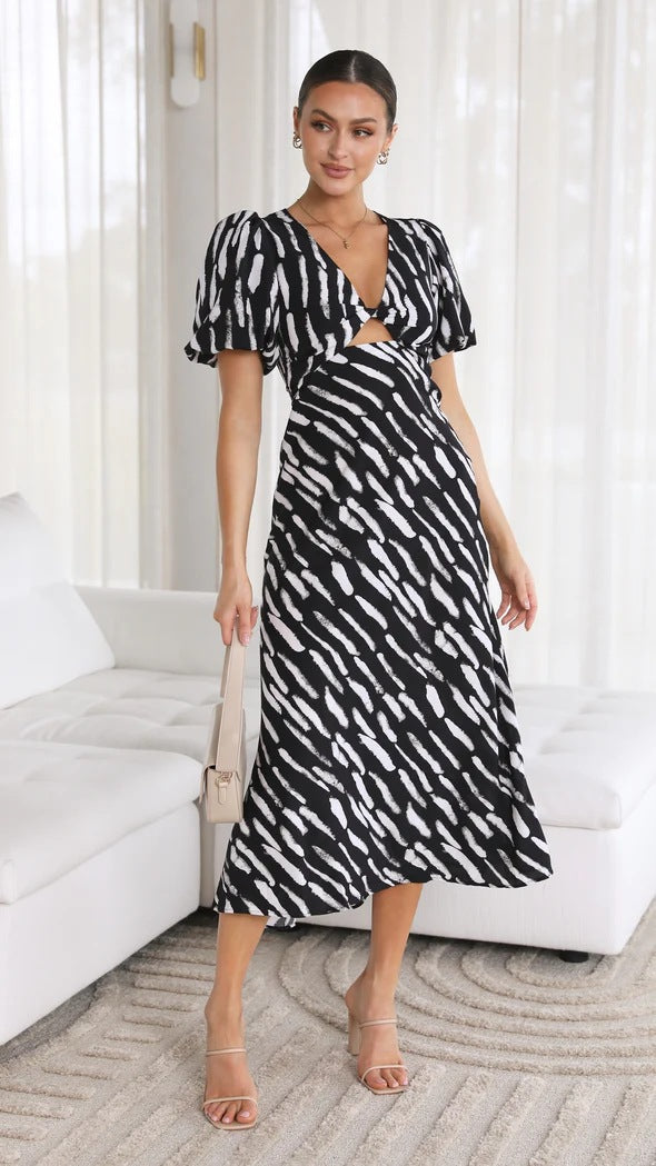 Robe mi-longue trapèze à imprimé et col en V