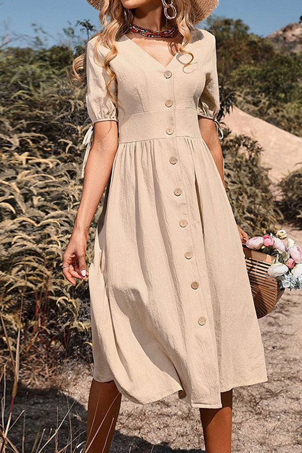 Robe en coton et lin de couleur unie à manches courtes et col en V